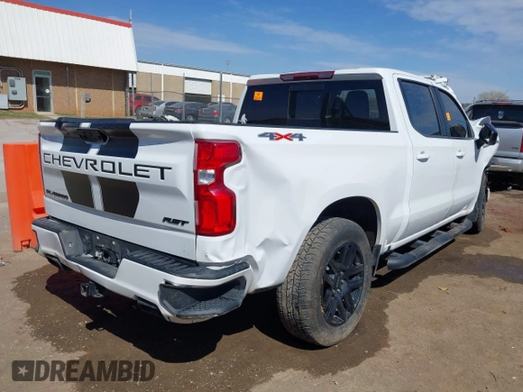 2022 Chevrolet Silverado 1500 RST with VIN 1GCUDEED1NZ551197, listed as a IAAI auction lot 41879518 with 65,042 mi miles and . Bid and sale history available at DreamBid. Image 4.