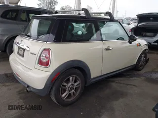 2013 MINI Hardtop with VIN WMWSU3C53DT684999, listed as a IAAI auction lot 42163800 with 89,774 mi miles and . Bid and sale history available at DreamBid. Image 4.