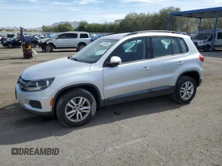2017 Volkswagen Tiguan S with VIN WVGAV7AX1HK026998, listed as a Copart auction lot 74959504 with 93,696 mi miles and Salvage Title. Bid and sale history available at DreamBid. Image 1.