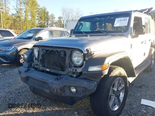 2018 Jeep Wrangler Unlimited Sport S z VIN 1C4HJXDG0JW158935, wystawiony jako IAAI lot #41187384 z przebiegiem 69 721 mil mil oraz . Historia ofert i sprzedaży dostępna na DreamBid. Obrazek 6.