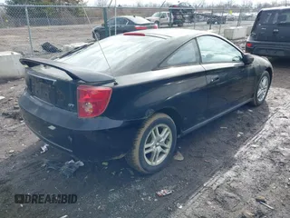 2003 Toyota Celica GT with VIN JTDDR32T730167041, listed as a IAAI auction lot 41471355 with 137,625 mi miles. Bid and sale history available at carsss.com. Image 4.