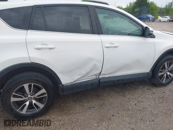 2018 Toyota RAV4 XLE with VIN 2T3WFREV4JW469929, listed as a IAAI auction lot 42536958 with 82,443 mi miles and . Bid and sale history available at DreamBid. Image 6.