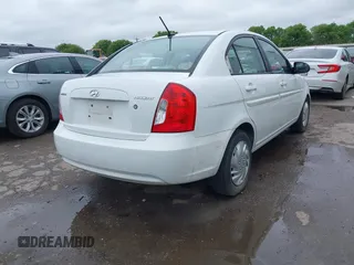 2009 Hyundai Accent Auto GLS with VIN KMHCN46C19U351198, listed as a IAAI auction lot 41896018 with 205,594 mi miles. Bid and sale history available at carsss.com. Image 4.