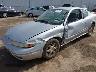 2003 Oldsmobile Alero GL1 z VIN 1G3NL12F53C266556, wystawiony jako IAAI lot #41561869 z przebiegiem 112 894 mil mil oraz . Historia ofert i sprzedaży dostępna na DreamBid. Obrazek 2.