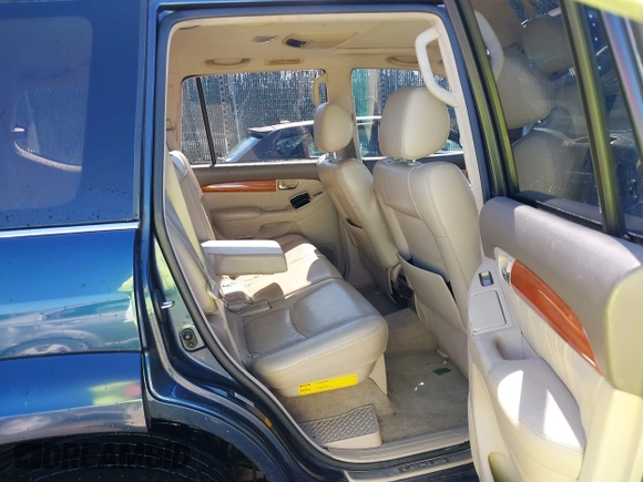2005 Lexus GX with VIN JTJBT20XX50081621, listed as a IAAI auction lot 41661384 with 208,071 mi miles. Bid and sale history available at carsss.com. Image 8.