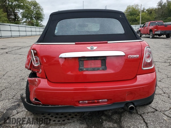 2011 MINI Convertible with VIN WMWZN3C51BTZ78331, listed as a Copart auction lot 73348304 with 94,219 mi miles and Salvage title. Bid and sale history available at DreamBid. Image 6.