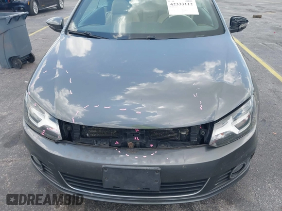 2014 Volkswagen Eos Sport with VIN WVWBW8AH2EV000313, listed as a IAAI auction lot 42333112 with 106,125 mi miles and . Bid and sale history available at DreamBid. Image 19.