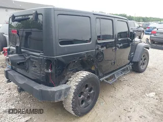 2018 Jeep Wrangler Unlimited Freedom z VIN 1C4BJWDG0JL803889, wystawiony jako IAAI lot #42782367 z przebiegiem 105 738 mil mil oraz . Historia ofert i sprzedaży dostępna na DreamBid. Obrazek 4.
