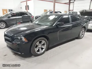 2011 Dodge Charger Road/Track with VIN 2B3CL5CT9BH511648, listed as a IAAI auction lot 42001157 with 103,223 mi miles. Bid and sale history available at carsss.com. Image 2.