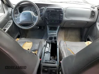 2000 Ford Explorer Eddie Bauer z VIN 1FMDU84P6YUA66404, wystawiony jako Copart lot #60629244 z przebiegiem 259 086 mil mil oraz Szkoda całkowita • Salvage title. Historia ofert i sprzedaży dostępna na DreamBid. Obrazek 8.