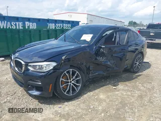 2020 BMW X4 xDrive30i z VIN 5UX2V1C04LLE67552, wystawiony jako IAAI lot #42248462 z przebiegiem 84 531 mil mil oraz . Historia ofert i sprzedaży dostępna na DreamBid. Obrazek 2.