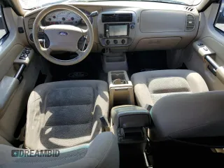 2004 Ford Explorer Sport Trac XLS with VIN 1FMZU67K64UA39174, listed as a Copart auction lot 61035465 with 196,912 mi miles and Salvage title. Bid and sale history available at DreamBid. Image 8.