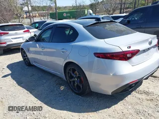 2021 Alfa Romeo Giulia Ti Sport with VIN ZARFAMBN1M7641345, listed as a IAAI auction lot 41856804 with 55,138 mi miles and . Bid and sale history available at DreamBid. Image 3.
