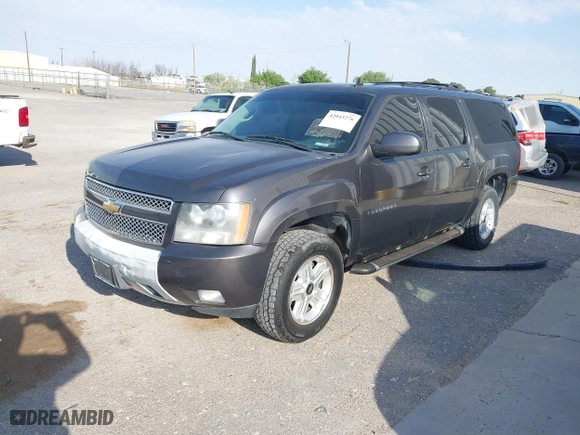 2011 Chevrolet Suburban LT with VIN 1GNSKJE34BR242629, listed as a IAAI auction lot 42043276 with 197,722 mi miles. Bid and sale history available at carsss.com. Image 17.