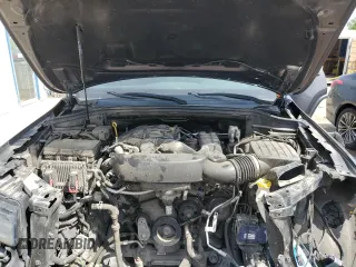2017 Jeep Grand Cherokee Trailhawk with VIN 1C4RJFLGXHC654112, listed as a Copart auction lot 56397195 with 168,136 mi miles and Salvage title. Bid and sale history available at DreamBid. Image 12.