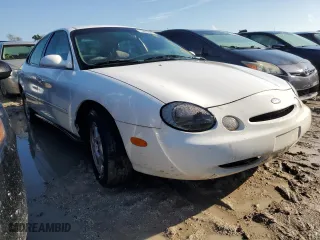 1996 Ford Taurus GL with VIN 1FALP52U6TA175539, listed as a Copart auction lot 73969534 with 118,371 mi miles and Salvage Title. Bid and sale history available at carsss.com. Image 4.