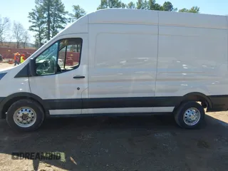 2023 Ford Transit Cargo with VIN 1FTBR2X88PKB45419, listed as a IAAI auction lot 41760563 with 71,536 mi miles and . Bid and sale history available at DreamBid. Image 14.