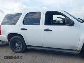 2013 Chevrolet Tahoe Commercial with VIN 1GNLC2E06DR273218, listed as a IAAI auction lot 42459013 with 181,495 mi miles and . Bid and sale history available at DreamBid. Image 14.