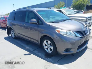 2014 Toyota Sienna LE AAS with VIN 5TDKK3DC6ES510818, listed as a IAAI auction lot 42610167 with 85,683 mi miles and . Bid and sale history available at DreamBid. Image 1.