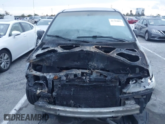 2002 Honda Odyssey LX z VIN 5FNRL18542B028358, wystawiony jako IAAI lot #41799092 z przebiegiem Nie podano mil oraz . Historia ofert i sprzedaży dostępna na DreamBid. Obrazek 13.