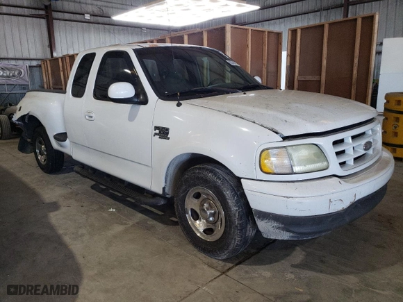 2002 Ford F-150 XL with VIN 2FTRX07242CA99167, listed as a Copart auction lot 88246375 with 0 mi miles and Salvage Title. Bid and sale history available at carsss.com. Image 4.
