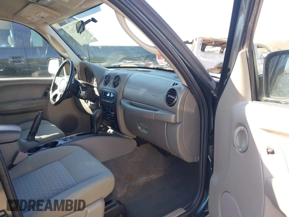 2005 Jeep Liberty Sport with VIN 1J4GL48K05W584675, listed as a IAAI auction lot 41867491 with 112,882 mi miles. Bid and sale history available at carsss.com. Image 5.
