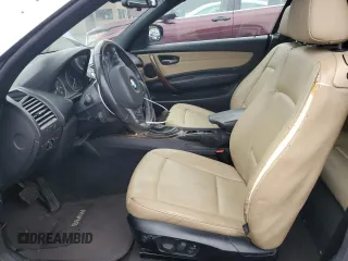 2011 BMW 1 Series 128i with VIN WBAUN1C59BVH82496, listed as a Copart auction lot 83407084 with 123,160 mi miles and Salvage Title. Bid and sale history available at carsss.com. Image 7.
