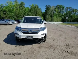 2019 Honda Pilot EX-L z VIN 5FNYF6H55KB080078, wystawiony jako Copart lot #55938415 z przebiegiem 54 857 mil mil oraz Szkoda całkowita • Salvage title. Historia ofert i sprzedaży dostępna na DreamBid. Obrazek 14.