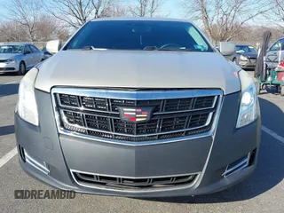 2013 Cadillac XTS Luxury z VIN 2G61R5S31D9185009, wystawiony jako IAAI lot #41243001 z przebiegiem 161 219 mil mil oraz . Historia ofert i sprzedaży dostępna na DreamBid. Obrazek 12.