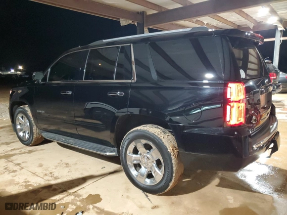 2017 Chevrolet Tahoe Premier with VIN 1GNSCCKC8HR371950, listed as a Copart auction lot 84276994 with 128,278 mi miles and Salvage Title. Bid and sale history available at carsss.com. Image 2.