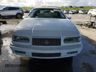 1995 Chrysler LeBaron z VIN 1C3EU4531SF671668, wystawiony jako Copart lot #74679224 z przebiegiem 77 023 mil mil oraz Nie do naprawy. Historia ofert i sprzedaży dostępna na DreamBid. Obrazek 5.