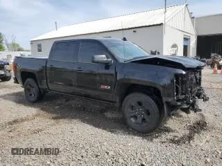 2018 Chevrolet Silverado 1500 LTZ with VIN 3GCUKSEC3JG247598, listed as a Copart auction lot 54361315 with 61,339 mi miles and Salvage Title. Bid and sale history available at DreamBid. Image 4.