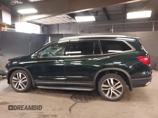 2016 Honda Pilot Touring with VIN 5FNYF6H98GB035226, listed as a IAAI auction lot 42022957 with 103,842 mi miles and . Bid and sale history available at DreamBid. Image 15.