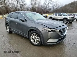 2017 Mazda CX-9 Touring z VIN JM3TCBCY7H0129695, wystawiony jako Copart lot #84193014 z przebiegiem 117 746 mil mil oraz Szkoda całkowita • Salvage title. Historia ofert i sprzedaży dostępna na DreamBid. Obrazek 11.