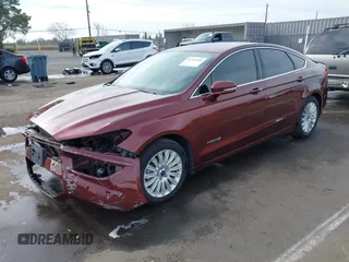 2015 Ford Fusion SE Hybrid with VIN 3FA6P0LU8FR172313, listed as a IAAI auction lot 41556556 with 152,567 mi miles. Bid and sale history available at carsss.com. Image 18.