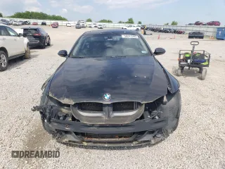 2009 BMW 3 Series 335i xDrive with VIN WBAWC73549E269679, listed as a Copart auction lot 56241505 with 180,961 mi miles and Salvage title. Bid and sale history available at DreamBid. Image 5.