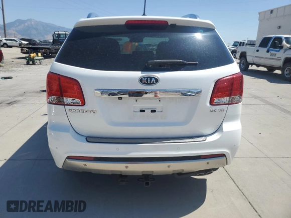 2013 Kia Sorento SX with VIN 5XYKW4A22DG383003, listed as a Copart auction lot 64064245 with 154,450 mi miles and Salvage title. Bid and sale history available at DreamBid. Image 6.