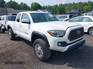 2020 Toyota Tacoma SR with VIN 5TFSZ5AN4LX219853, listed as a IAAI auction lot 42478087 with 70,018 mi miles and . Bid and sale history available at DreamBid. Image 1.