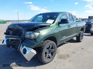 2011 Toyota Tundra 4WD Truck with VIN 5TFUM5F18BX020803, listed as a IAAI auction lot 41856078 with 110,119 mi miles. Bid and sale history available at carsss.com. Image 2.