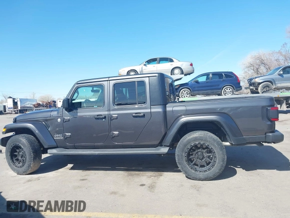 2021 Jeep Gladiator Overland z VIN 1C6HJTFG3ML588042, wystawiony jako IAAI lot #41730427 z przebiegiem 22 344 mil mil oraz . Historia ofert i sprzedaży dostępna na DreamBid. Obrazek 15.