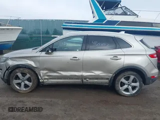 2015 Lincoln MKC with VIN 5LMCJ1A96FUJ30579, listed as a IAAI auction lot 41684147 with 144,364 mi miles and . Bid and sale history available at DreamBid. Image 14.