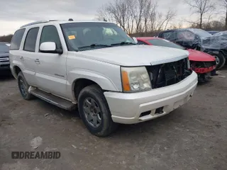 2005 Cadillac Escalade z VIN 1GYEK63NX5R121562, wystawiony jako IAAI lot #41923728 z przebiegiem 242 610 mil mil oraz . Historia ofert i sprzedaży dostępna na DreamBid. Obrazek 1.