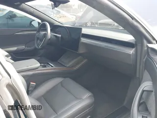 2023 Tesla Model S with VIN 5YJSA1E53PF510757, listed as a IAAI auction lot 42075624 with Not provided miles and . Bid and sale history available at DreamBid. Image 5.