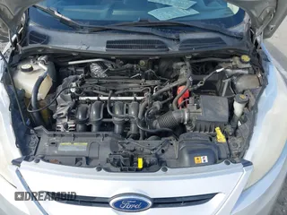 2011 Ford Fiesta SES with VIN 3FADP4FJ1BM102434, listed as a IAAI auction lot 41703287 with 124,476 mi miles. Bid and sale history available at carsss.com. Image 10.