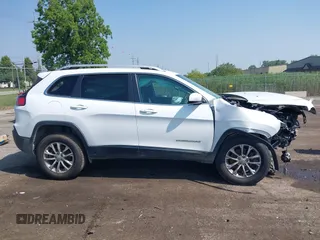 2019 Jeep Cherokee Latitude Plus with VIN 1C4PJMLN8KD167776, listed as a IAAI auction lot 42730399 with 59,548 mi miles and . Bid and sale history available at DreamBid. Image 13.