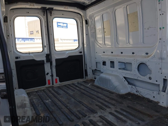 2018 Ford Transit with VIN 1FTYR2CM9JKA52056, listed as a IAAI auction lot 42542981 with 151,835 mi miles and . Bid and sale history available at DreamBid. Image 8.