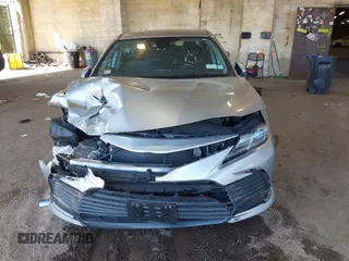 2023 Toyota Camry LE z VIN 4T1C11AK5PU127664, wystawiony jako IAAI lot #41653925 z przebiegiem 24 378 mil mil oraz . Historia ofert i sprzedaży dostępna na DreamBid. Obrazek 12.