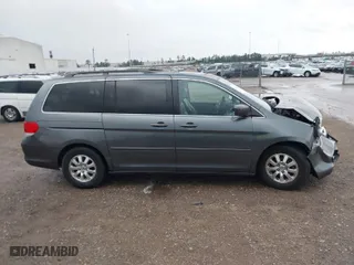 2010 Honda Odyssey EX-L with VIN 5FNRL3H78AB113568, listed as a IAAI auction lot 41181639 with 132,130 mi miles. Bid and sale history available at carsss.com. Image 13.