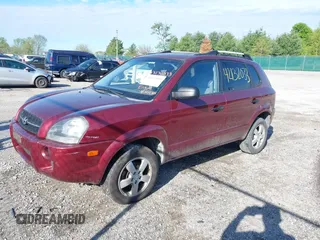 2008 Hyundai Tucson GLS with VIN KM8JM12B88U710566, listed as a IAAI auction lot 42132033 with 215,442 mi miles. Bid and sale history available at carsss.com. Image 2.