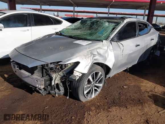 2019 Nissan Maxima Platinum z VIN 1N4AA6AV6KC363764, wystawiony jako IAAI lot #41506203 z przebiegiem 92 415 mil mil oraz . Historia ofert i sprzedaży dostępna na DreamBid. Obrazek 2.